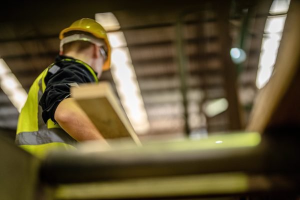 Man,Cleaning,Timber,Wood,In,Dark,Warehouse,Industry.,Team,Worker Man,Cleaning,Timber,Wood,In,Dark,Warehouse,Industry.,Team,Worker
